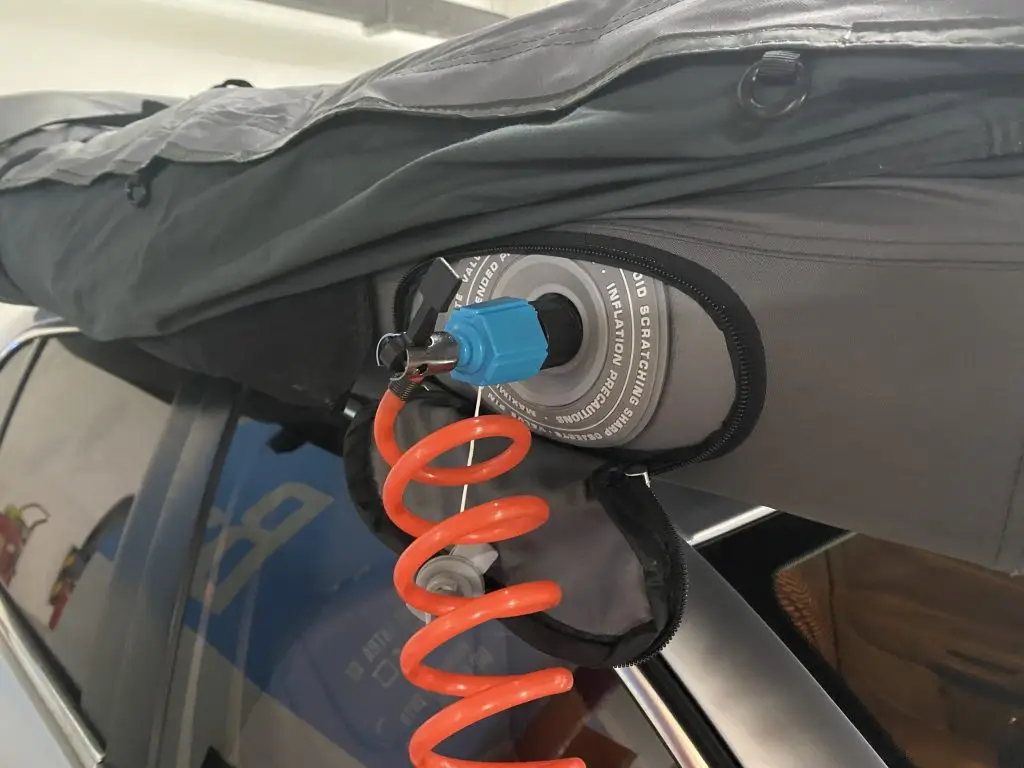 Using an electric air pump to inflate an inflatable rooftop tent