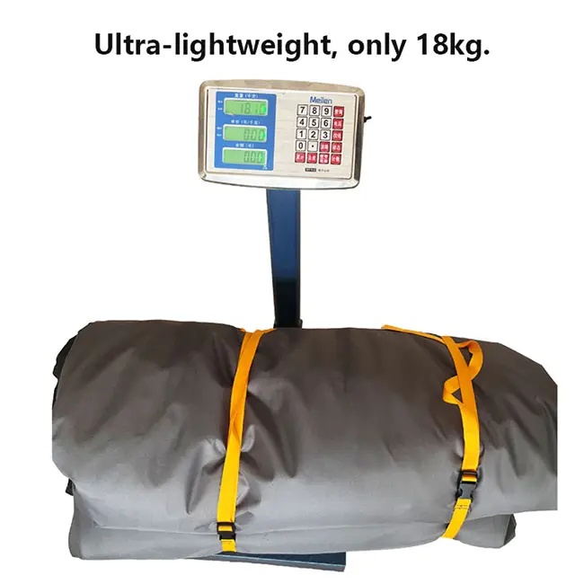 Weighing the Playdo brand inflatable rooftop tent on a scale