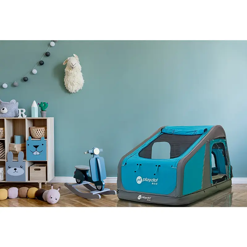 Fish Island inflatable tent pitched indoors as kids play tent, turquoise and gray, versatile ground mode